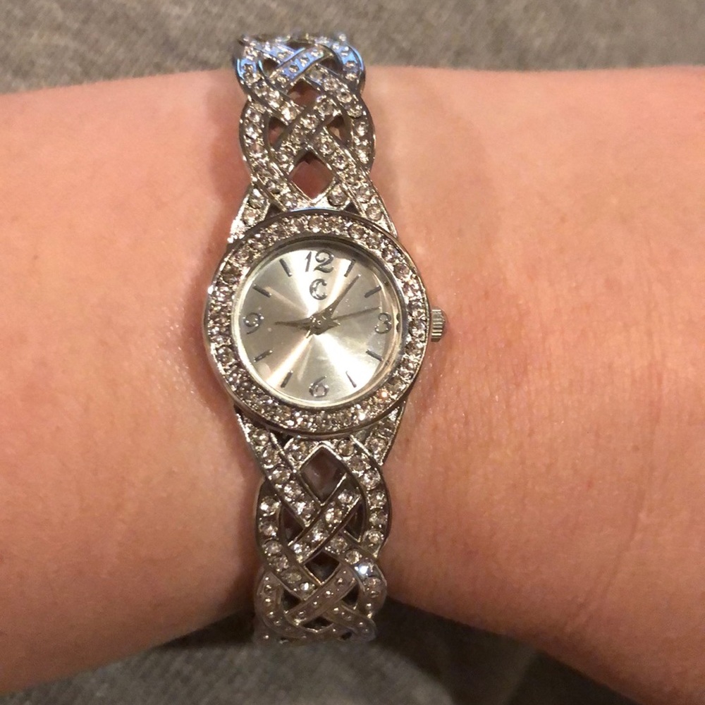 Silver tone watch. Rhinestones